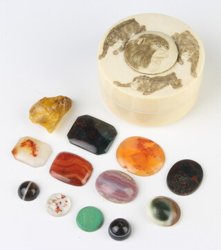 A Japanese Meiji period circular box decorated with monkeys 6cm together with a collection of hardstones 