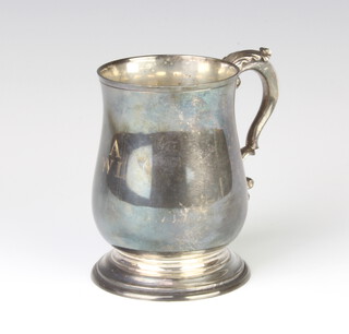 A Georgian style silver baluster mug with S scroll handle, London 1979, engraved monogram, 239 grams, 10cm 