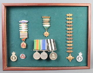 A group of medals comprising Defence medal, Police Long Service and Good Conduct medal and Service medal of The Order of St John of Jerusalem to Const. Lawrence G.Harding together with 2 Brighton Police cap badges, National Cycling Proficiency Examiner and Instructor badge, Long Service Safe Driving award and St John Ambulance Association medal with 12 bars 