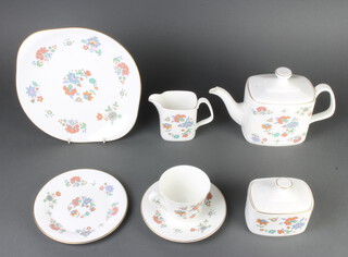 A Royal Doulton Madrigal pattern part coffee set comprising coffee pot, milk jug, sugar bowl, 5 cups, 5 saucers, 4 small plates, a sandwich plate, a ditto Sovereign pattern - 6 coffee cans, 6 saucers, 6 small plates, 6 dinner plates, a Susie Copper White Wedding part set - 6 coffee cans and 6 saucers and a Royal Albert Paisley Shawl - 7 tea cups, 11 saucers, milk jug, sugar bowl, 10 small plates, 2 sandwich plates  