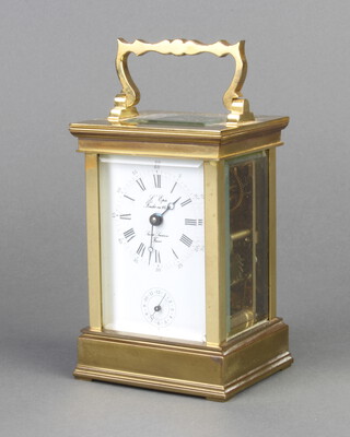 L'epee, a 20th Century carriage alarm clock with enamelled dial and Roman numerals, contained in a metal case (bell has been removed) 