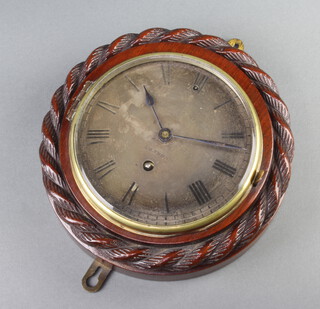 V.A.P Brevete, an Edwardian wall timepiece with silvered dial  marked Norie & Wilson London contained in a carved oak wheel case 19cm 