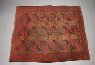 A blue and red ground Afghan carpet with 18 octagons to the centre within a multi row border 263cm x 222cm 