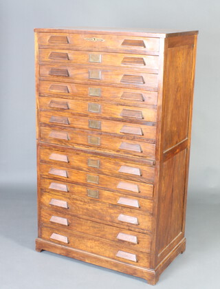 A 1920's Continental mahogany shop fitting, fitted 13 shallow drawers with wedge shaped handles 148cm h x 86cm w x 52cm d 