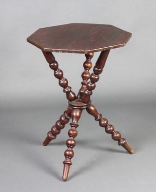 A Victorian octagonal mahogany gypsy table raised on turned supports 63cm h x 47cm w x 47cm d 