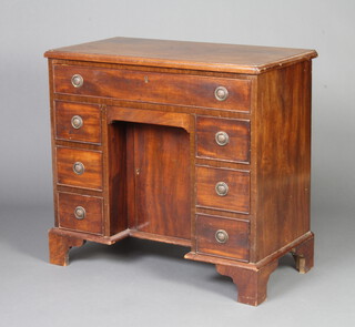 A 19th Century mahogany dressing table fitted a frieze drawer, the pedestal fitted a secret drawer above cupboard enclosed by a panelled door flanked by 6 short drawers, raised on bracket feet 75cm h x 80cm w x 43cm d 