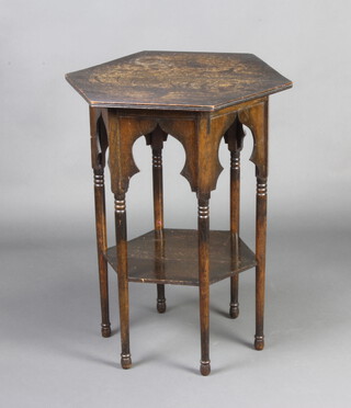 An Art Nouveau octagonal oak 2 tier occasional table raised on turned supports 68cm h x 55cm w x 47cm d 