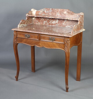 A 19th Century French walnut wash stand, the with pink veined marble top with 3/4 gallery, the base fitted 2 drawers, raised on cabriole supports 100cm h x 89cm w x 49cm d 