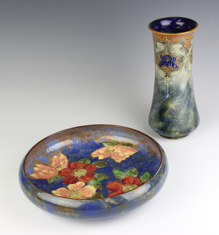 A Royal Doulton vase decorated with stylised flower heads 24cm, a ditto shallow dish 27cm 