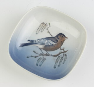 A Royal Copenhagen dish decorated with a bird 10cm, an oval ditto decorated a butterfly 11cm 
