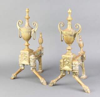 A pair of 19th Century Adam style brass fire dogs in the form of lidded urns 45cm h x 22cm w x 26cm d 