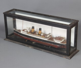A wooden model of the two funnelled liner Anglia contained in an ebonised and glazed case 46cm h x 114cm w x 25cm d  