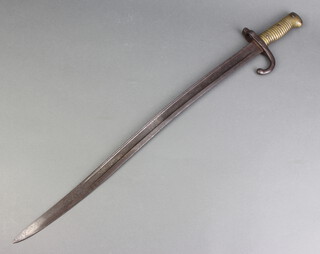 A French chassepot bayonet with cross bar marked T95658, blade unmarked with slight corrosion and slightly bent to the end