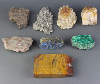 A section of malachite together with other geological specimens 