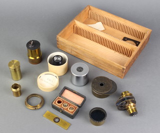 A collection of various brass microscope lenses etc 