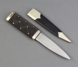 A Wilkinson Sword Dirk with 8.5cm blade complete with scabbard