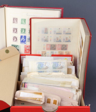 A stock book of Rhodesian mint and used stamps, an album of Australian, Western Samoa, New Zealand mint and used stamps, George VI and later together with a collection of loose world stamps contained in a shoe box