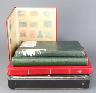 A stock book of Austrian mint and used stamps, album of used world stamps Italy and Spain, album of world stamps Morocco, Nigeria, Indonesia, Japan and a stock book of French mint stamps and an album of United Nation mint stamps 