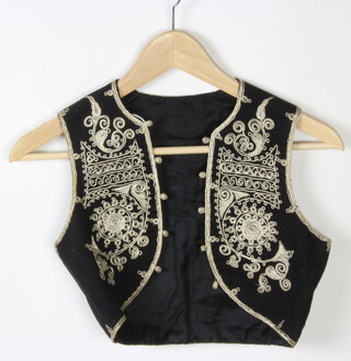 A small black and silver Bolero waistcoat together with 2 Victorian white fabric mess waistcoats and a red cumberband 
