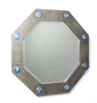 An octagonal Arts and Crafts pewter and ruskin jewelled bevelled plate wall mirror set 8 "Ruskin" plaques 57cm x 56cm  