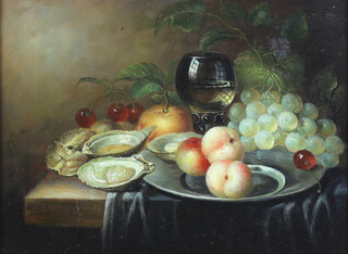 20th Century Continental oil on panel, unsigned, still life with a pewter plate, fruits, oysters and a wine glass, 29cm x 39cm 