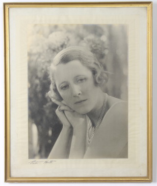 Malcolm North, a black and white portrait photograph of Lady Malcolm Campbell 37cm x 26cm, 1 other Sir Donald Campbell 28cm x 23cm, ditto Ginaa? Campbell 25cm x 20cm and 2 black and white portrait photographs of Dorothy Wilding 31cm x 21cm and 33cm x 24cm 