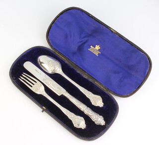 A Victorian cased set of silver knife fork and spoon decorated with classical ladies, London 1889, weighable silver 119 grams
