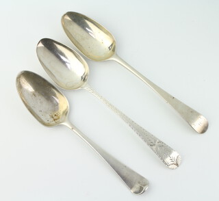 A George III Old English pattern silver table spoon, London 1768 and 2 others, 185 grams