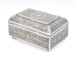 A Continental silver filigree rectangular box raised on bun feet 11.5cm, 223 grams 