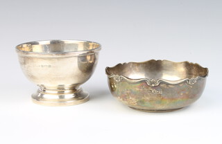 A circular silver pedestal bowl Birmingham 1931, 10cm and 1 other, 193 grams