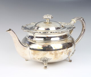 A Victorian style squat baluster silver teapot with shell rim and scroll feet Sheffield 1979, maker Mappin & Webb, 897 grams gross 