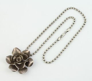 A silver bead necklace with rose pendant 42 grams 