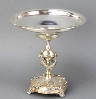 An Edwardian silver plated centrepiece raised on scroll and mask feet 