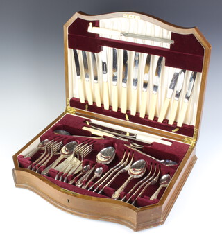 An Art Deco canteen containing  a set of silver plated cutlery for 6 