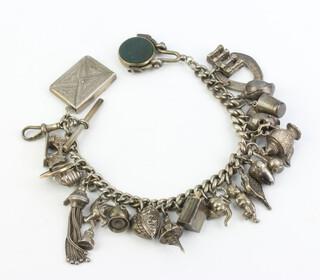 A silver charm bracelet, 105 grams 