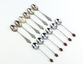 Two sets of silver coffee spoons, rubbed marks, 91 grams 