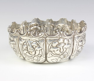 An Edwardian repousse silver bowl with floral decoration, 142 grams