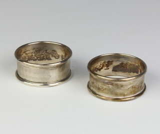 A pair of silver engine turned napkin rings 14 grams 
