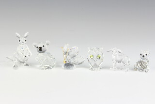 A Swarovski Crystal figure of a kangaroo 6cm, ditto of an owl 3cm, a goat 4cm, cat 3cm, koala bear 4cm and butterfly 3cm (only 4 pieces boxed) 