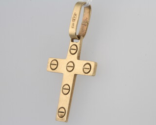 A 9ct yellow gold Cartier style cross pendant 4.3 grams