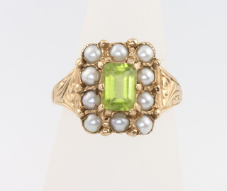 A yellow gold peridot and seed pearl ring size L 1/2