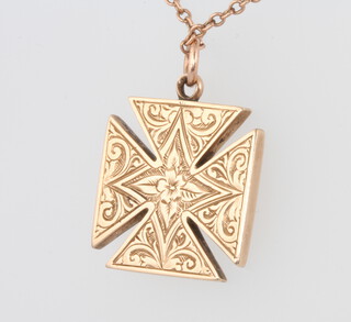 A 9ct rose gold cross pendant and chain 4.5 grams