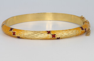 A yellow gold guilloche enamel bangle 20 grams 