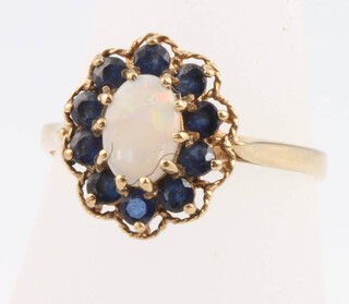 A 9ct yellow gold opal and sapphire cluster ring size O, 2.3 grams