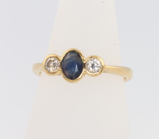 An 18ct yellow gold sapphire and diamond ring size L 