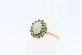 A 9ct yellow gold emerald and opal cluster ring size L 2.8 grams