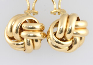 A pair of 18ct yellow gold whirl ear clips 23 grams 