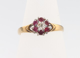 A 9ct yellow gold ruby and diamond cluster ring size L, 1.6 grams