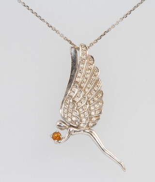 An 18ct white gold diamond pendant in the form of a fairy on a ditto chain 38mm, 6.3 grams