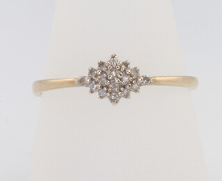 A 9ct yellow gold diamond cluster ring size U, 1.6 grams 